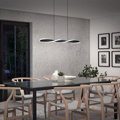 Modern dining room with a glass table, six wooden chairs, a minimalist Artika Finley Linear LED pendant light 3 CCT, a potted plant, wall art, and large glass doors showcasing an outdoor view.