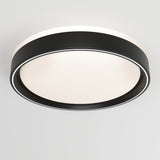 A modern, round ceiling light fixture with a black outer ring and a frosted white diffuser, mounted on a white ceiling.