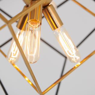 The Artika Imperium 9-light chandelier features a gold geometric frame and bright Edison bulbs against a light background.