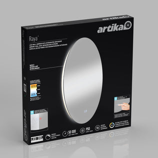 A black box displays Artikas Raya 24 in. LED mirror with 3 CCT and defogger. The packaging shows a large mirror image and highlights features like touch controls, 50,000-hour lifespan, and integrated defogger in English and French.