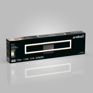A rectangular black Artika box for the Dover 27-in (69 cm) Integrated LED 5-CCT Vanity Light Bar displays the chrome bathroom fixture, specs, and energy efficiency info on a gray background.