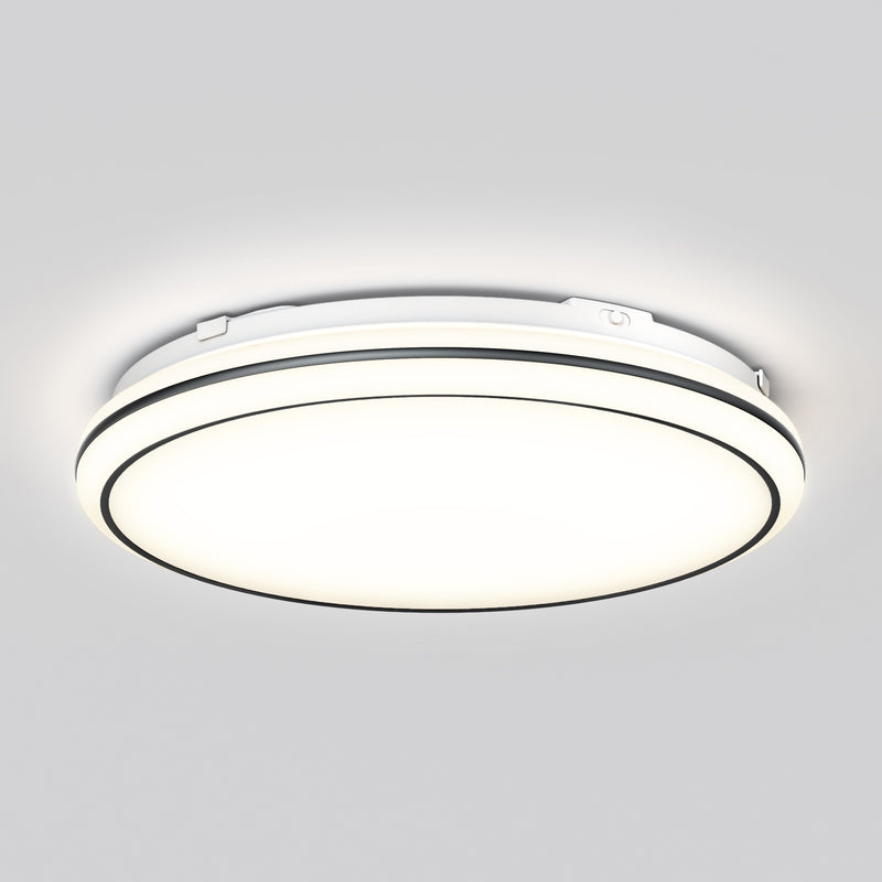 The Artika Emina 13 in. LED flush mount light features a modern round design with a white cover and slim black ring, delivering a soft, even 1,800-lumen glow and three selectable color temperatures.