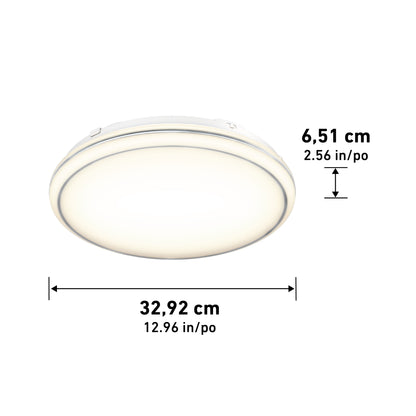 The Artika Emina 13 in. LED flush mount light 3 CCT is a round, white ceiling fixture measuring 6.51 cm (2.56 in) high with a diameter of 32.92 cm (12.96 in).