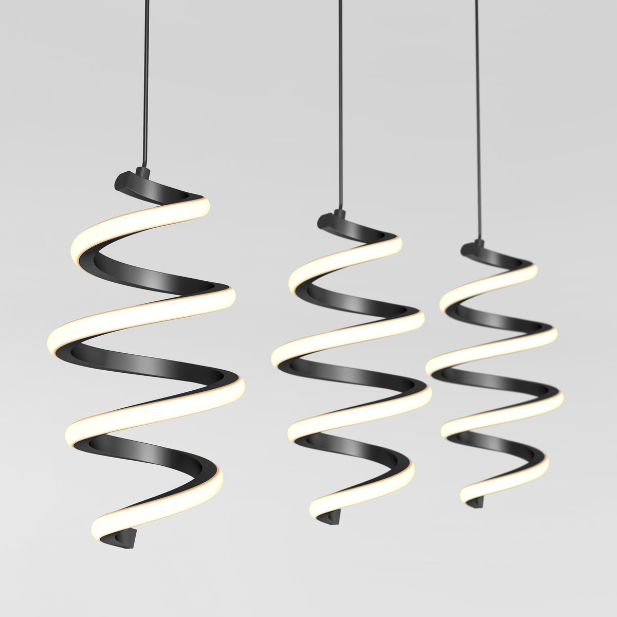 Three modern pendant lights with spiral, ribbon-like black frames and glowing white edges hang from the ceiling against a plain light gray background.