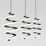 Three modern pendant lights with spiral, ribbon-like black frames and glowing white edges hang from the ceiling against a plain light gray background.