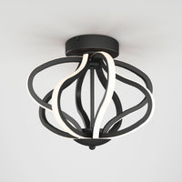 The Artika Meridian LED flush mount light features black, looped metal bands and integrated LED strips in an abstract, spherical design, creating a modern look against a plain white ceiling.