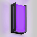 A modern wall light fixture with a rectangular black frame and a glowing purple panel, mounted on a light-colored wall. The light emits a soft, vibrant purple glow.