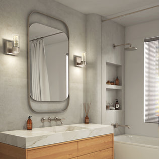 Modern bathroom with double sink, large mirror, Artika Essence LED vanity light, built-in shelves, and a rain showerhead bathtub.