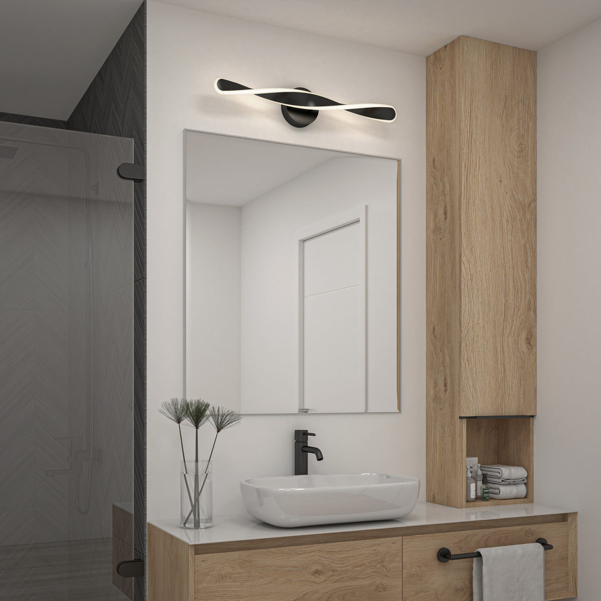 Modern bathroom with a large mirror, rectangular sink, wooden vanity, black faucet, and wall-mounted light fixture above the mirror. Minimalist decor with a vase of plants and neatly arranged towels.