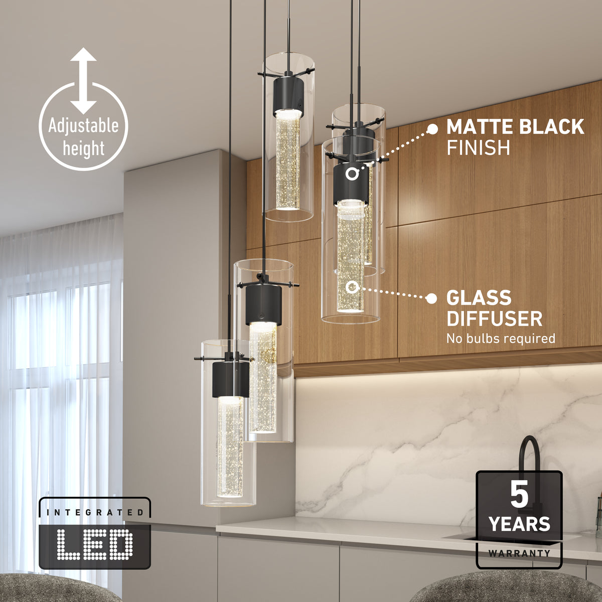 Modern kitchen with three cylindrical pendant lights featuring matte black finishes and glass diffusers, hanging above a countertop. Text highlights adjustable height, integrated LED, and a 5-year warranty.