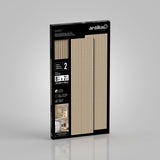 A rectangular black package of Artika Sonofoil wall slat panels is shown against a gray background. The package shows light wood panels and product details, including size (24.5 x 86cm), quantity (2 panels), and usage images.