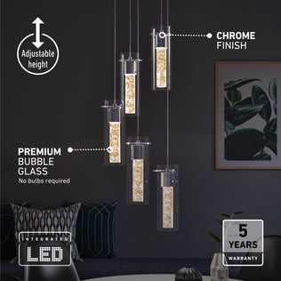 Artika Essence 5-light LED pendant with bubble glass and chrome finish, featuring integrated LEDs above a modern table and chair.