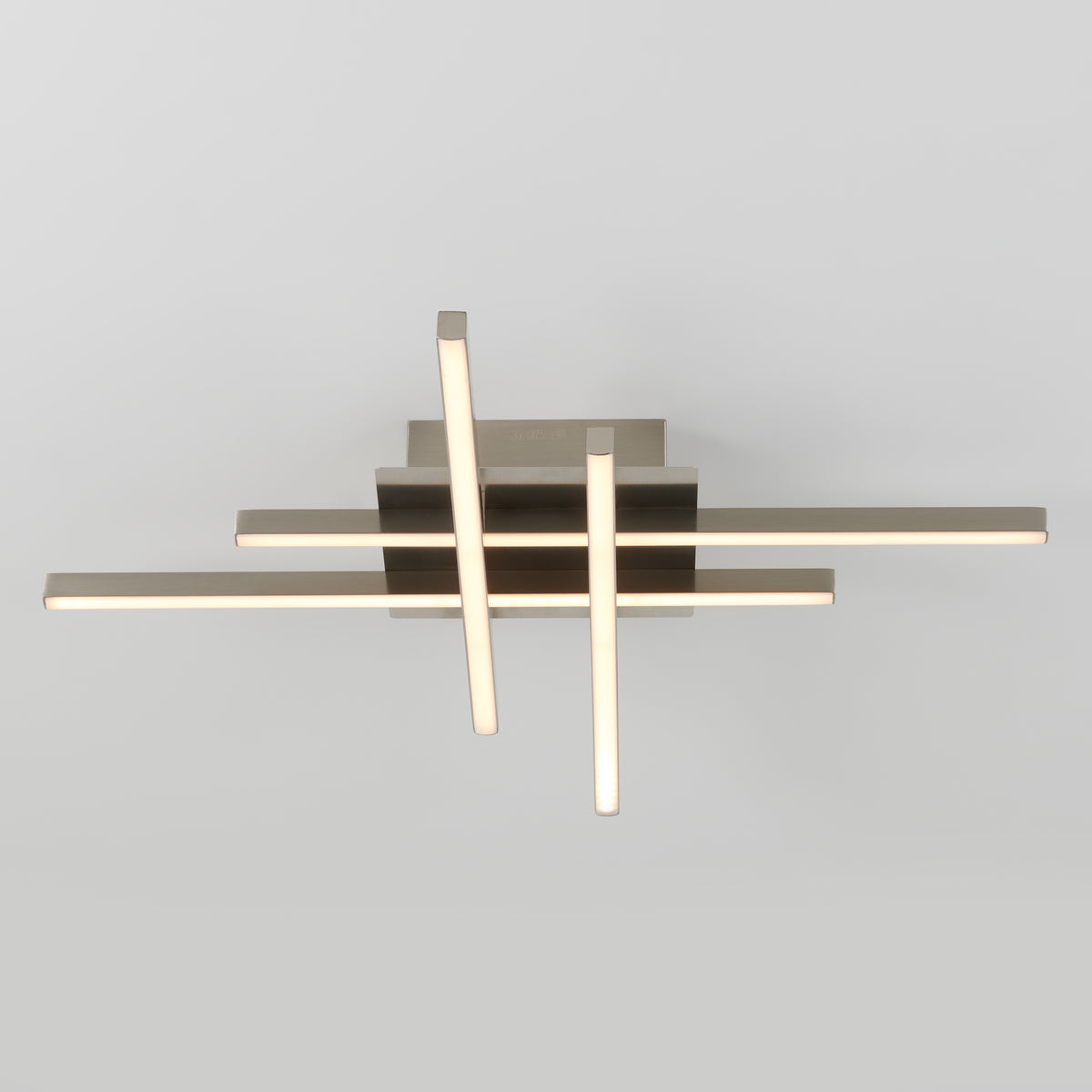 A modern ceiling light fixture with intersecting horizontal and vertical metal bars, each with integrated LED lighting, mounted on a square base against a plain light background.