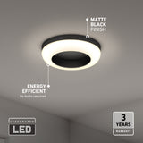 A round ceiling light with a matte black finish and integrated LED, glowing softly. Text highlights its energy efficiency, matte black finish, 3-year warranty, and that no bulbs are required.