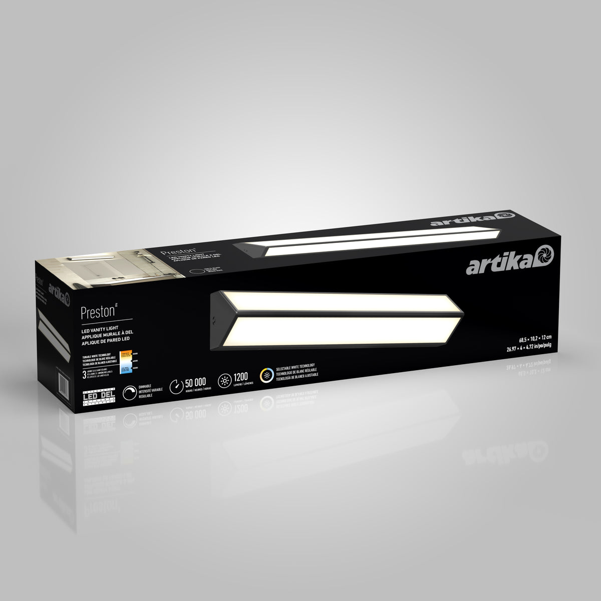 A rectangular Artika Preston LED vanity light box is shown on a gray background. The black packaging displays an image of the light, product details, and specifications including brightness, wattage, and lifespan.