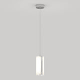 A modern pendant light with a cylindrical frosted glass shade hangs from a thin cord attached to a round ceiling mount against a plain white background.