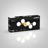 A black and gold Artika Bloom LED light fixture box, featuring an image of the gold fixture with six white globes, product details, and branding on a plain, light gray background.