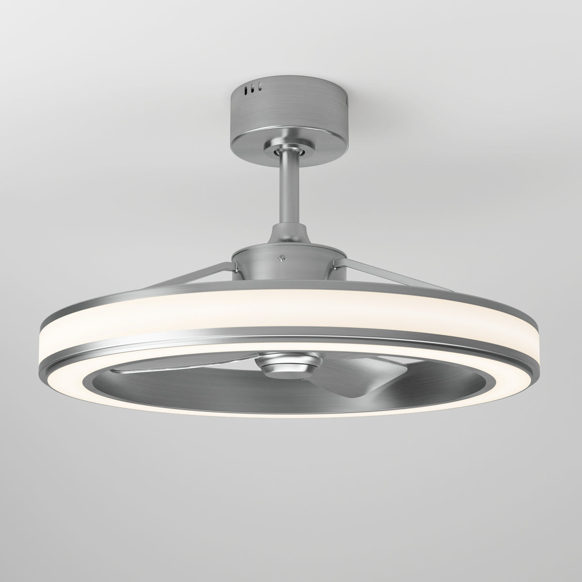 A modern ceiling fan with a circular LED light ring, metallic finish, and three blades, mounted on a short downrod against a plain white ceiling.