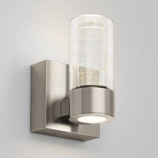 Artika Essence 1-light LED vanity light with bubble glass shade, ideal for accent lighting on a light grey wall.
