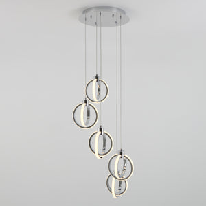 The Artika Soho modern 5-light LED pendant features five illuminated rings suspended at different heights from a round base, creating a striking contemporary ceiling light against a plain white background.