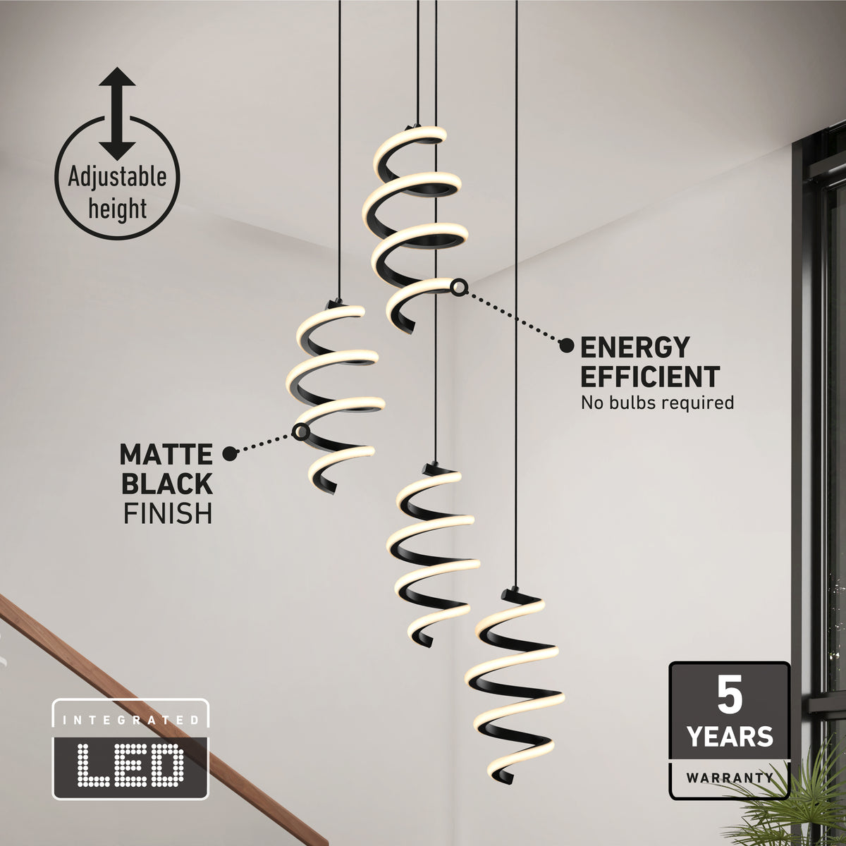 Modern staircase with two Artika Chorus 4 light LED pendants. Matte black finish, integrated LED, adjustable height, energy efficient. Features 5 CCTs, “no bulbs required,” and a 5-year warranty.