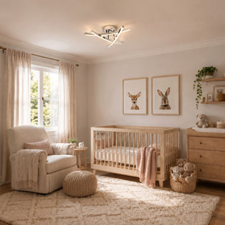 Neutral nursery with crib and rug features the Artika Orly 18" LED ceiling light, offering 3 CCT for adjustable cozy ambiance.