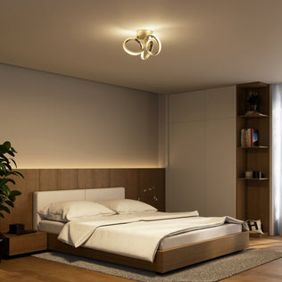 Modern bedroom with a low wooden bed, white bedding, built-ins, and Artika Swirl LED flush mount ceiling light.
