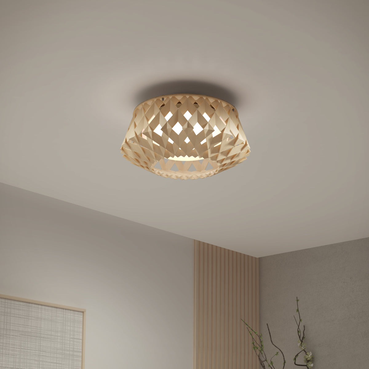 A ceiling light fixture with a woven, lattice-like wooden shade emits soft, warm light. The ceiling and upper corner of a modern, minimalist room with neutral colors are visible.