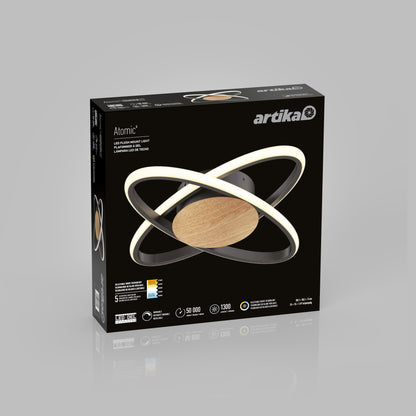 A black box for the Artika Atomic 15 in. LED flush mount light 5 CCT displays the round, modern fixture with two illuminated rings and a wood accent at the center. Product details and icons are shown on the packaging.