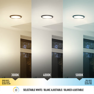 The Artika Europa Disk 9 in. LED modern flush mount light offers 3 selectable color temperatures—3000K, 4000K, and 5000K—illuminating a modern room with a large window. Text reads Selectable White.