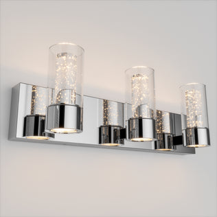 Artika’s Essence 3 LED bathroom vanity light features a modern chrome finish and three cylindrical bubble glass shades.