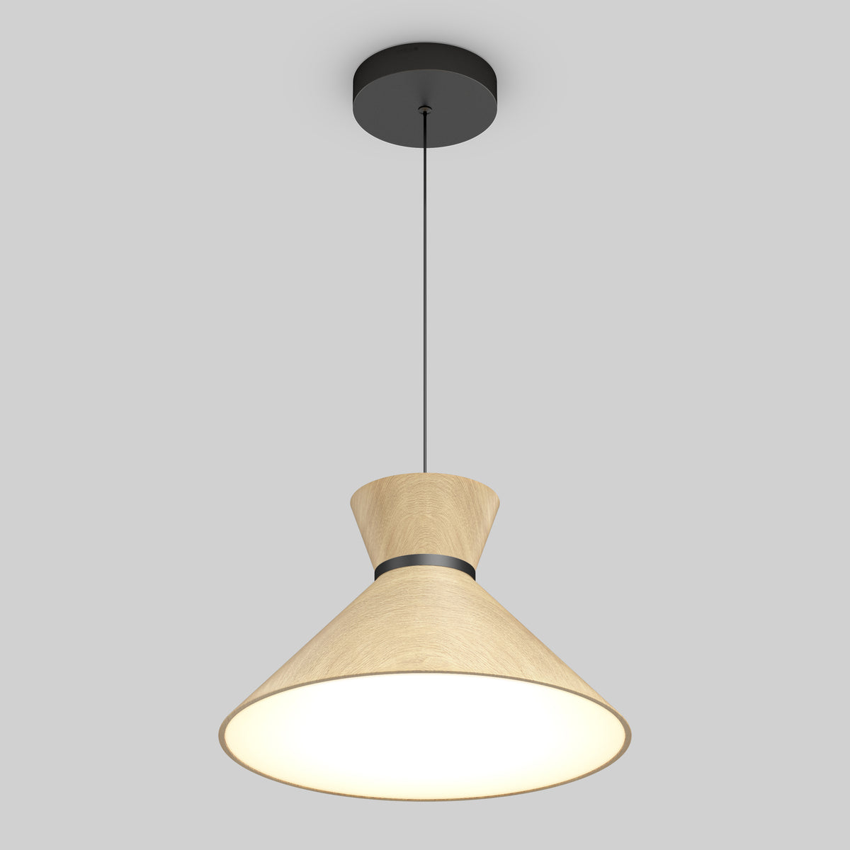 A modern ceiling pendant light with a wooden, hourglass-shaped shade and a black ceiling mount, suspended by a thin black cord, emits a soft, warm glow against a plain gray background.
