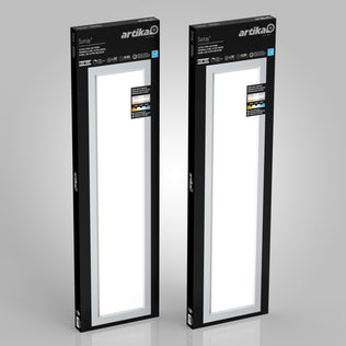 Two rectangular Artika Sunray ultra thin LED light panel 3 CCT boxes are shown upright in black packaging with white accents, product information, and a display window revealing the lights inside.
