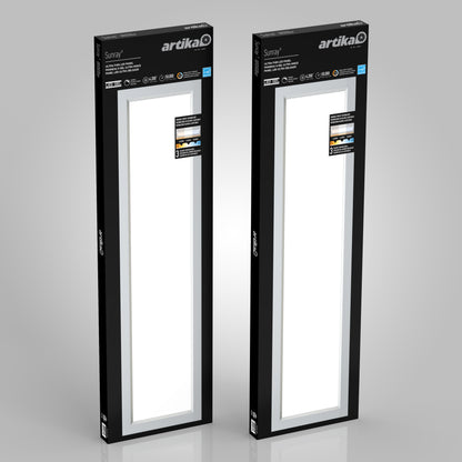 Two upright black boxes contain Artika Sunray ultra thin LED light panel 3 CCTs. The packaging showcases the brand, features, and a panel image against a light gray background.