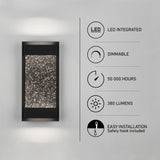 A modern black wall sconce emits light above and below, with a star-like pattern panel. Next to it, icons list features: LED integrated, dimmable, 50,000 hours, 380 lumens, and easy installation with safety hook.