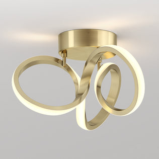 The Artika Swirl LED flush mount features three gold rings and 1300 lumens—ideal for stylish, modern interiors.