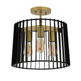 A modern ceiling light fixture with a round black metal cage, gold interior frame, and three exposed vintage-style Edison bulbs.