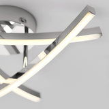 A modern ceiling light fixture with sleek, intersecting chrome bars featuring integrated LED strips, mounted on a round chrome base against a white ceiling.