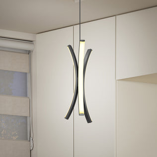 The Artika Corben Pendant LED light 5CCT Black features two curved, illuminated arms and hangs in a minimalist room with white cabinets and a beige window shade.