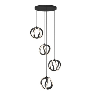 The Artika Vivaldi modern LED 4-light pendant features four black circular LED lights with curved ribbon-like designs, each hanging at varying heights from a round black ceiling mount. Adjustable with 5 CCT color settings.