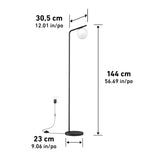 A black floor lamp with a round white shade, shown with dimensions: 144 cm (56.69 in) tall, 30.5 cm (12.01 in) wide at the top, and a base diameter of 23 cm (9.06 in). The lamp is plugged into a wall outlet.