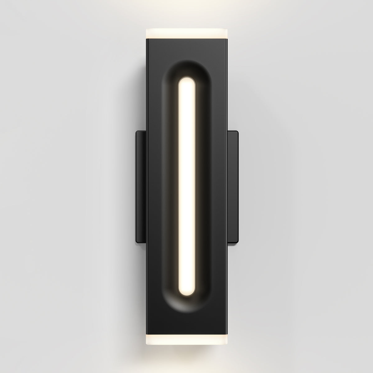 A modern black wall sconce with a vertical, recessed frosted light strip in the center, mounted on a white wall. The sconce emits soft, even illumination from the top, bottom, and center.