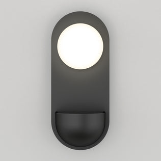 The Artika Bloomfield LED modern mid-century wall sconce 5 CCT features a round white light atop a curved dark gray base, shown here against a plain light gray background.