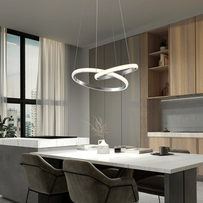 Modern dining with a marble table, velvet chairs, and Artika’s Mora 28″ LED Pendant above built-in wood cabinets.