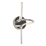 A modern wall sconce with a circular chrome base and a looped, tubular light design extending vertically and curving in front of the base.