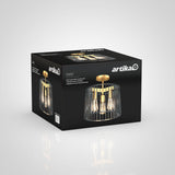 A black box with the artika logo displays a modern gold and black three-light ceiling fixture, named Gatsby, with an image of the fixture and product details on the packaging.