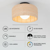 A woven, round ceiling light with a visible bulb is shown above icons and text highlighting features: LED integrated, 50,000 hours, dimmable, easy installation, 1200 lumens, and selectable white technology.