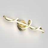 Modern wall-mounted light fixture with a gold base and a tubular LED light, twisted in a decorative spiral design, casting a soft glow against a plain white background.