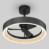 A modern ceiling fan with three black blades, surrounded by a circular LED light ring with a wood accent on the inner edge, mounted on a black base against a light gray background.