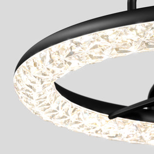 Close-up of Artika's Carat 23" LED modern ceiling fan with remote, black frame, and gemstone-cut diffuser on light gray background.